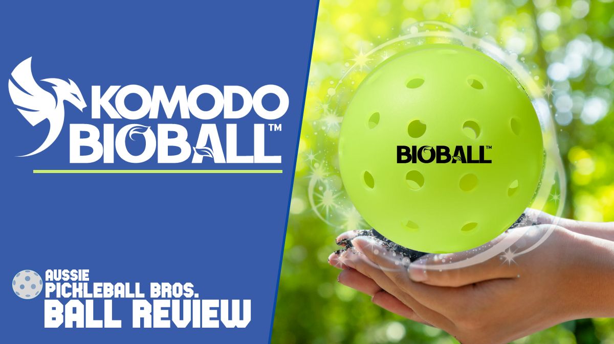 Komodo BIOBall pickleball review thumbnail featuring the Komodo and BIOBall logos on a blue background alongside a hand holding a green BIOBall pickleball, with Aussie Pickleball Bros Ball Review branding